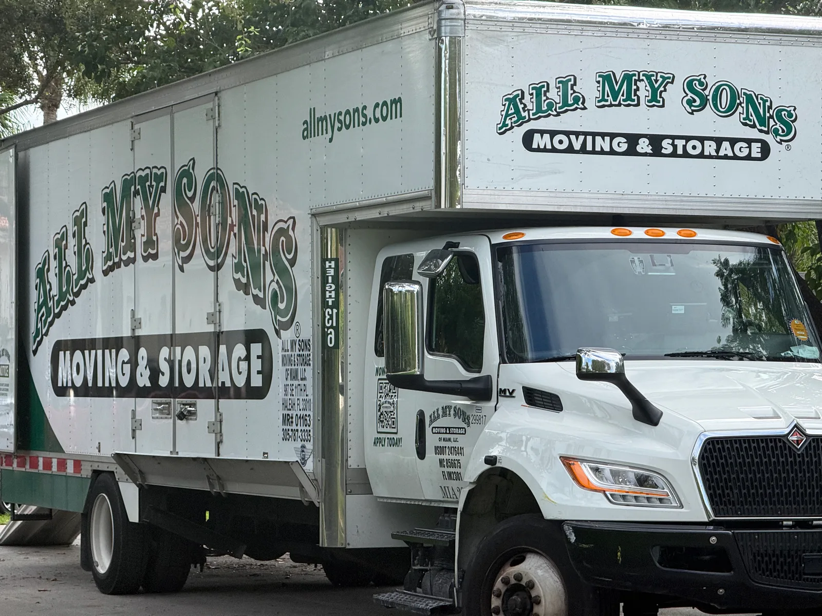 All My Sons Moving & Storage of Miami work vehicle displaying its business signage and contact information