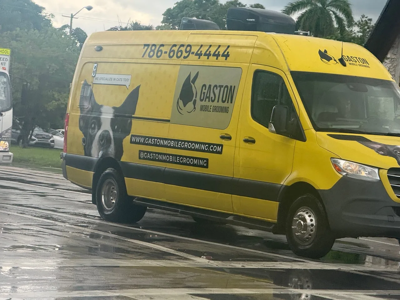 Gaston Mobile Grooming work vehicle displaying business contact information