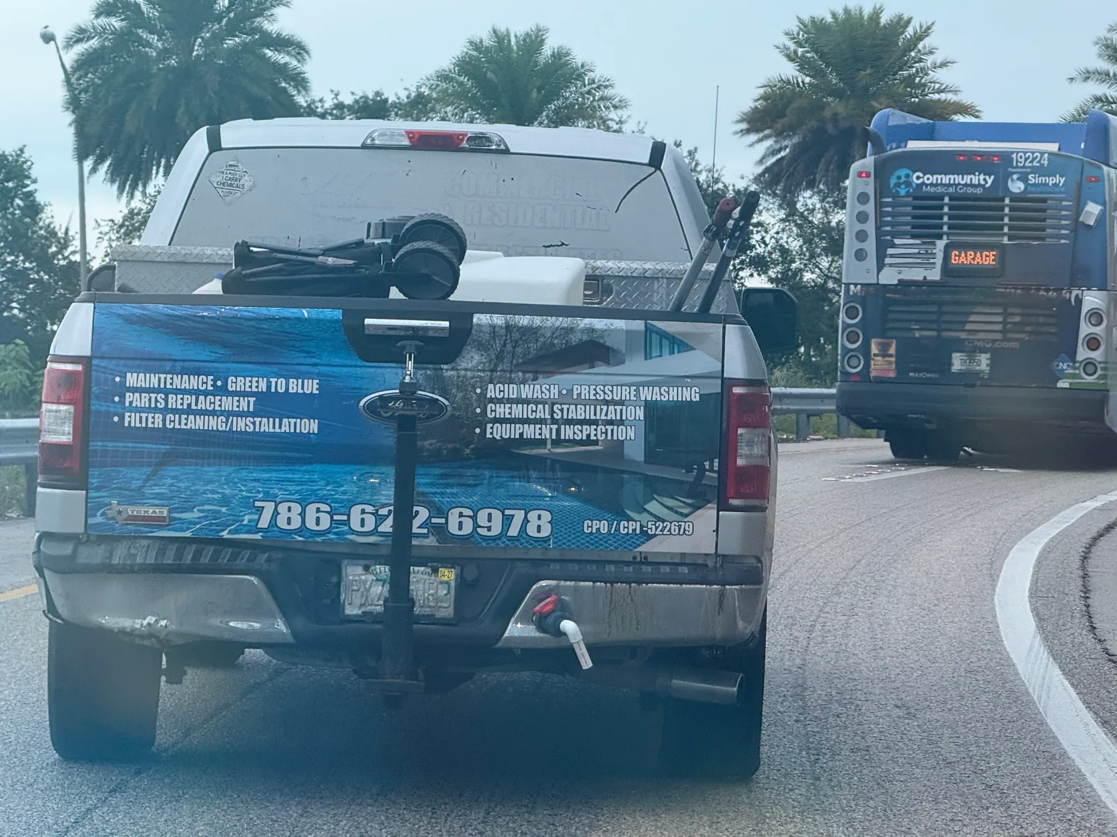 LT Pool & Spa Services work vehicle displaying its business name and contact information — photo 2 of 3