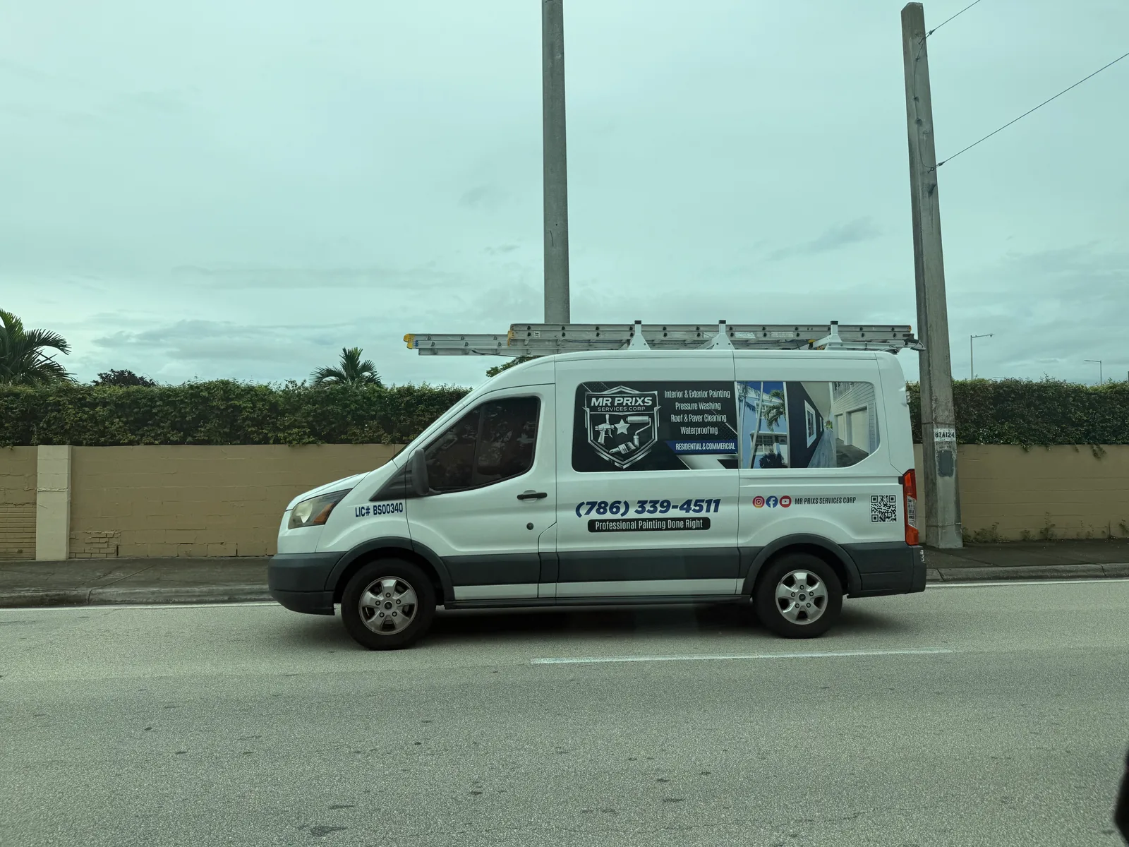MR PRIXS Services Corp work vehicle displaying its business name and contact information