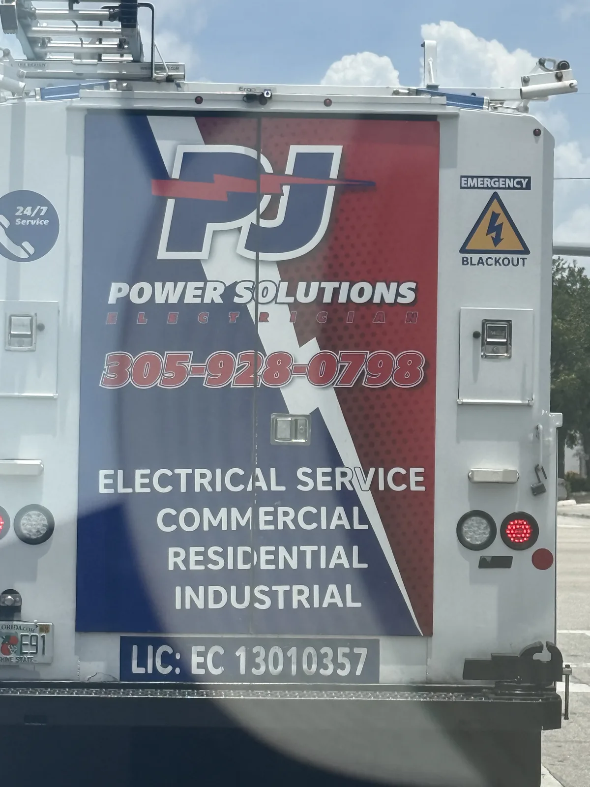 PJ Power Solutions electrical service truck advertising 24-hour emergency service