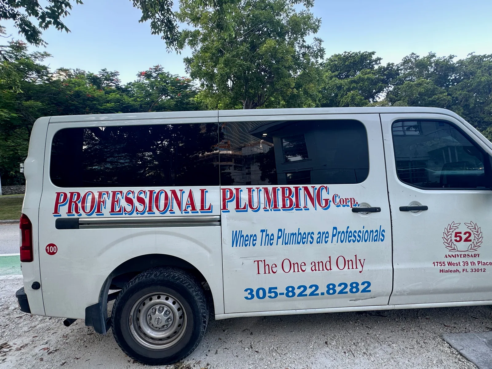 Professional Plumbing Corp work vehicle displaying phone number 305-822-8282 and Hialeah address — photo 1 of 2