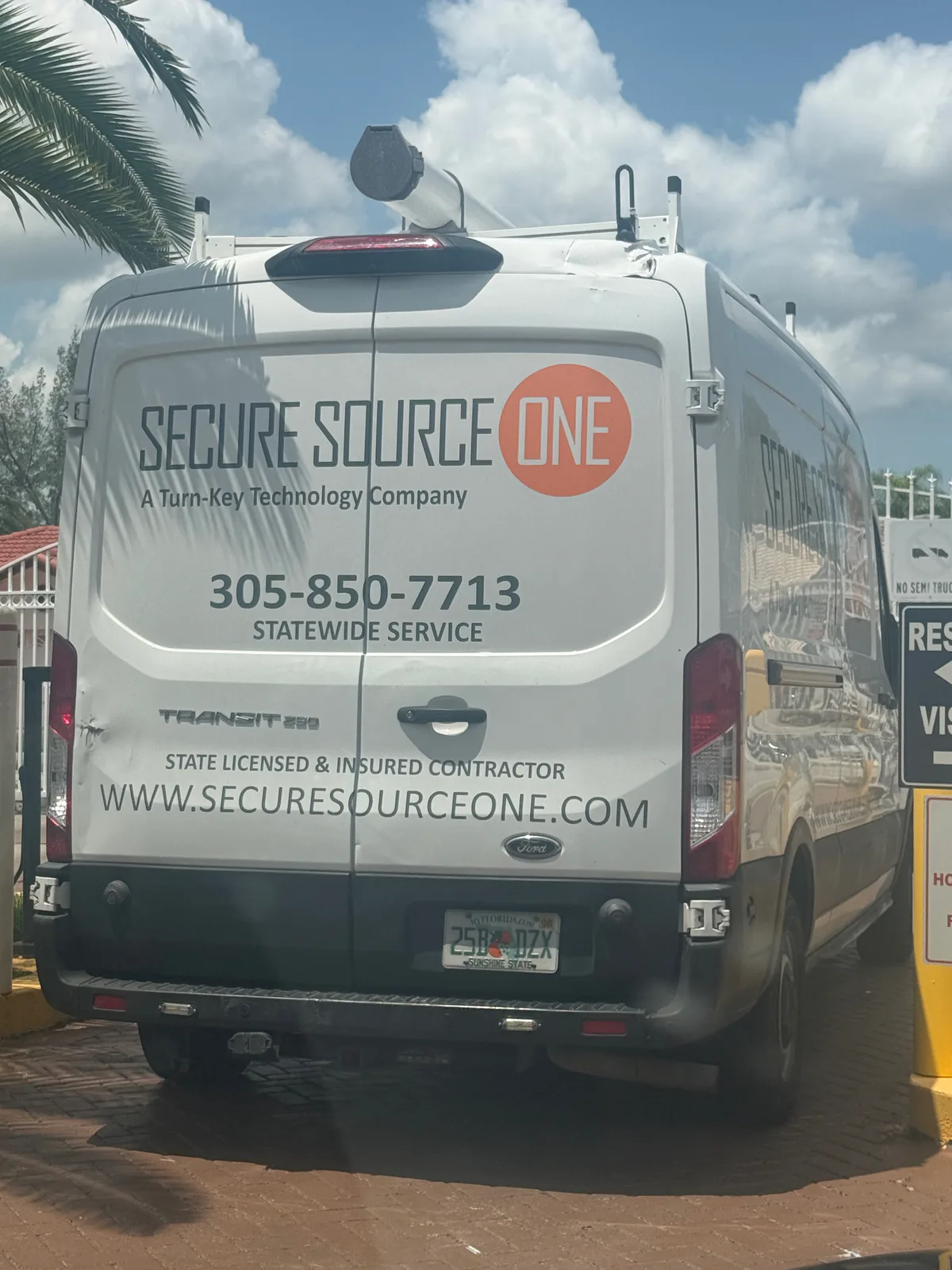Secure Source One technology-service van displaying phone number 305-850-7713, statewide service, and the company website — photo 2 of 2