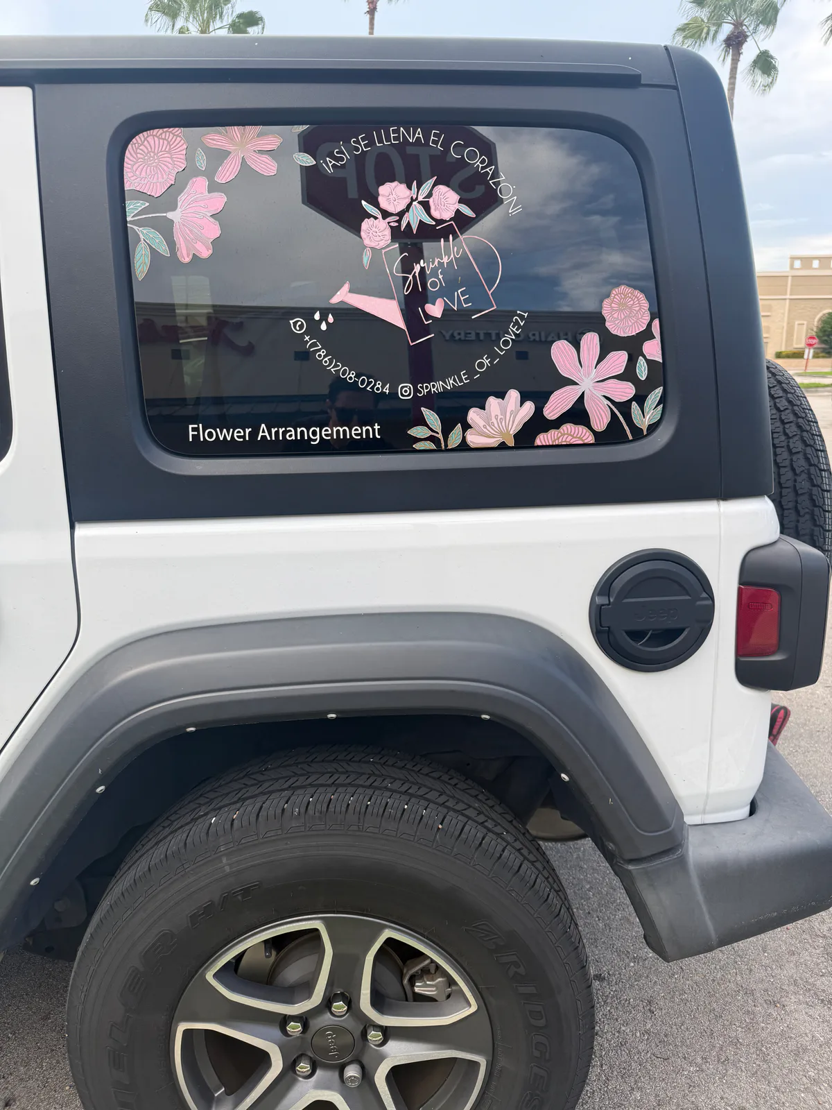Sprinkle of Love flower-arrangement vehicle graphic displaying WhatsApp number 786-708-0284 and Instagram handle sprinkle_of_love21