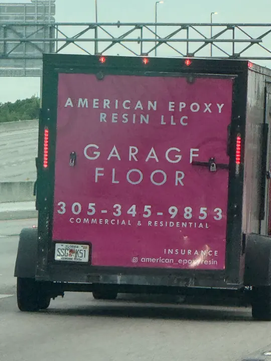 American Epoxy Resin LLC work vehicle displaying its business signage and contact information