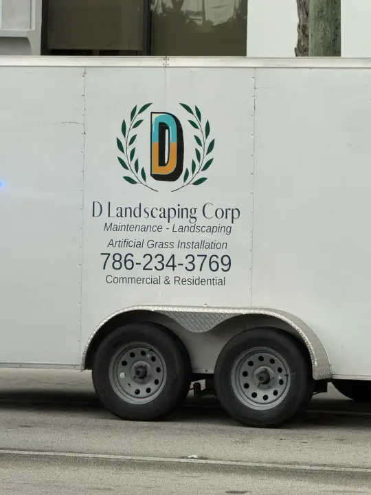 D Landscaping Corp work vehicle displaying its business signage and contact information