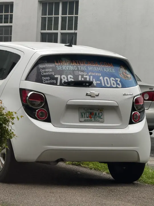 Limpia Tu Casa work vehicle displaying its business name and contact information