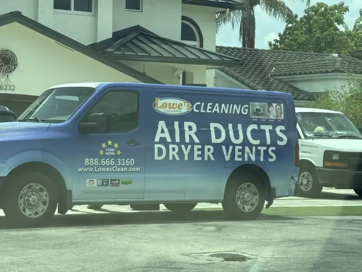 Blue Lowe's Cleaning van advertising air-duct and dryer-vent cleaning