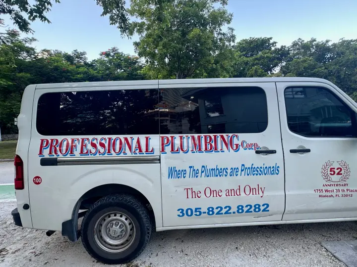 Professional Plumbing Corp work vehicle displaying phone number 305-822-8282 and Hialeah address