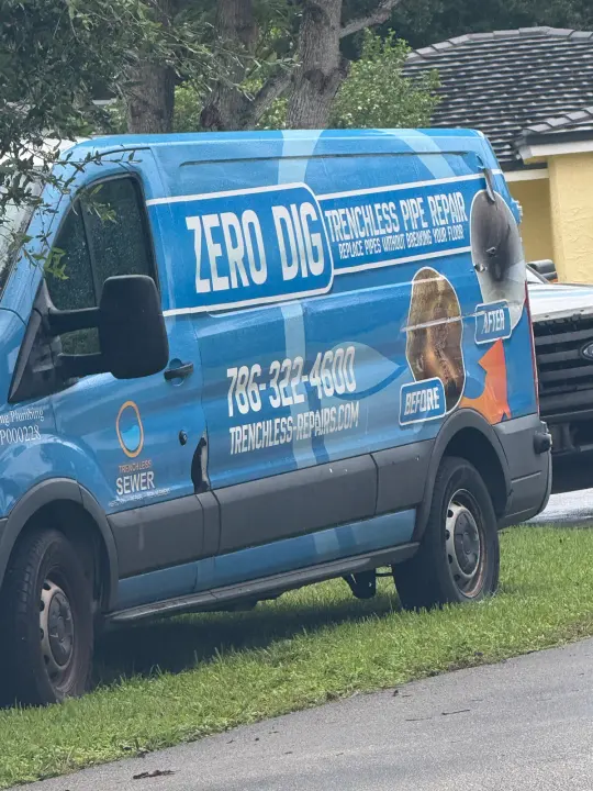 Trenchless Sewer Line Repairs work vehicle displaying its name and phone number